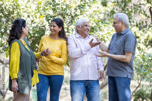 Group of indian senior male and woman friends At park
