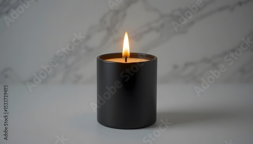 Elegant black matte candle with golden flame, lighting and shadows, isolated on pure white
