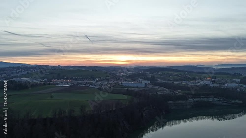 Sunset Aerial View of Fribourg Area with City Lights, Switzerland
