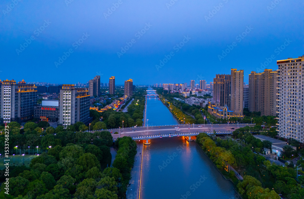 Obraz premium Aerial view of urban scenery in the suburbs of Shanghai at sunset.