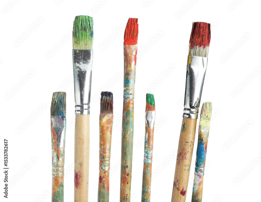 Obraz premium Brushes with different paints isolated on white