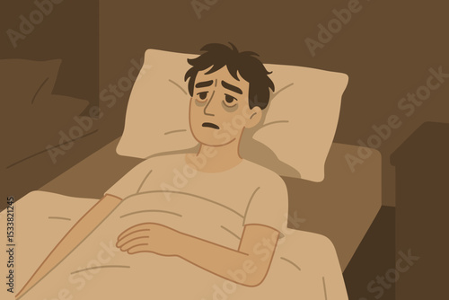 Worried man sitting in bed late at night experiencing anxiety and mental health struggle
