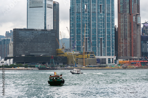 Photography Photo of buildings under construction in Kowloon on a cloudy day