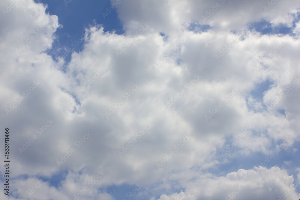 Blue sky with puffy clouds Blue sky with puffy clouds