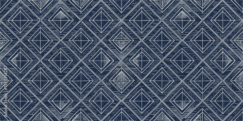 Elegant blue geometric pattern with intricate diamond shapes.