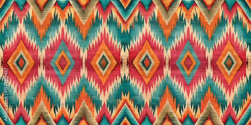 Colorful geometric pattern featuring vibrant reds, blues, and yellows.