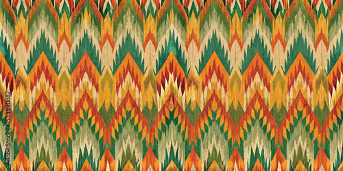 Vibrant zigzag pattern with shades of green, orange, and gold.