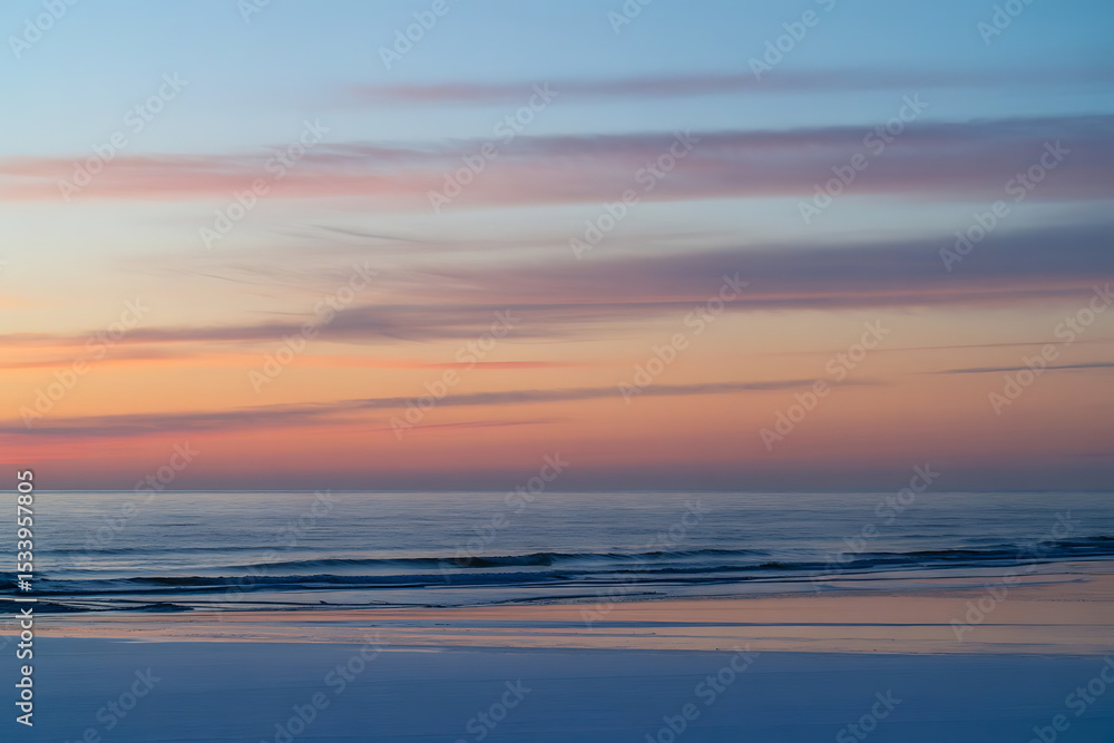 Obraz premium Serene Sunset Over Calm Icy Ocean Waters 