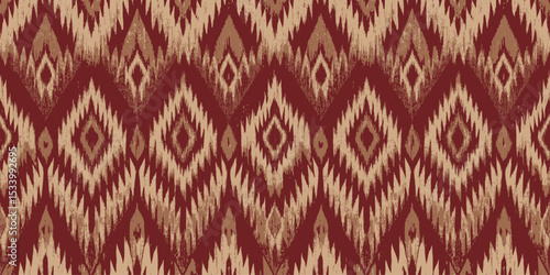 Elegant red and cream diamond-pattern fabric with an intricate design.
