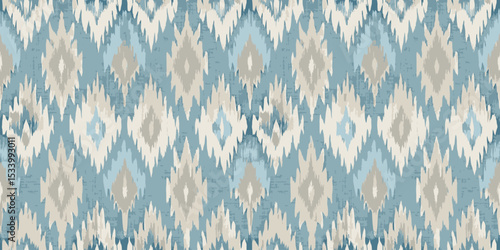 Elegant blue and beige patterned fabric with a modern abstract design.