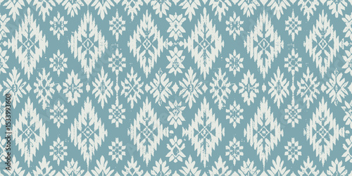 Elegant light blue and white geometric pattern featuring intricate diamond shapes.