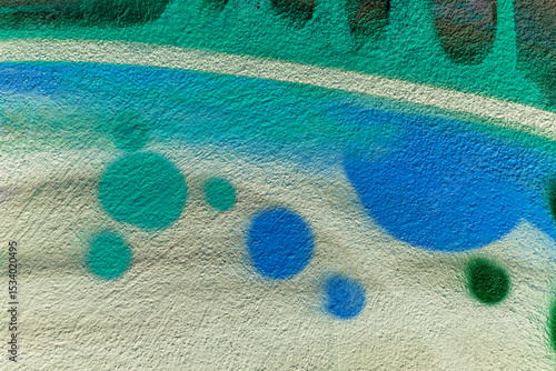 beautiful wallpaper of street wall graffiti painting of aerosol urban art. Colorful city background of spray graffiti drawing in modern culture style