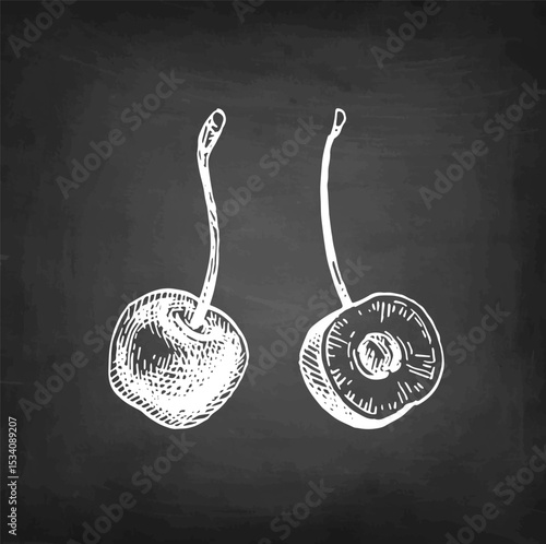 Chalk sketch of whole and halved cherry