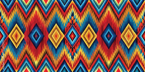 Vibrant geometric patterns in red, blue, and yellow tones create a lively decorative textile.