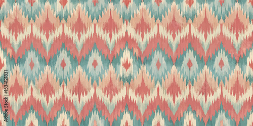 Colorful abstract textile pattern featuring zigzag and diamond shapes.