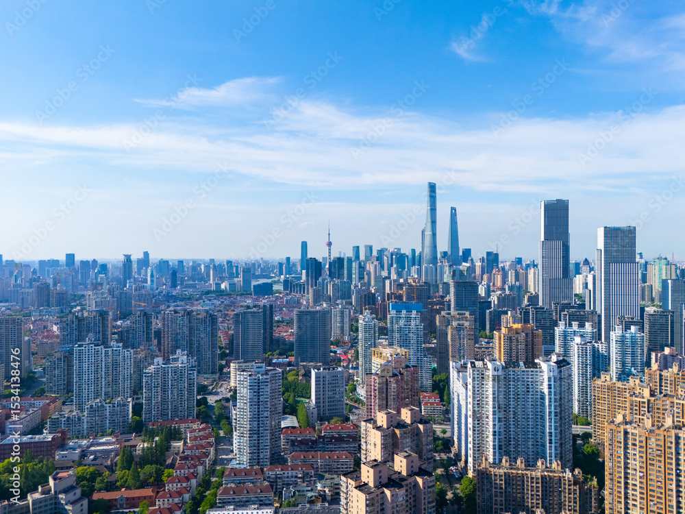 Fototapeta premium Aerial view of Shanghai skyscraper in downtown with blue sky background.