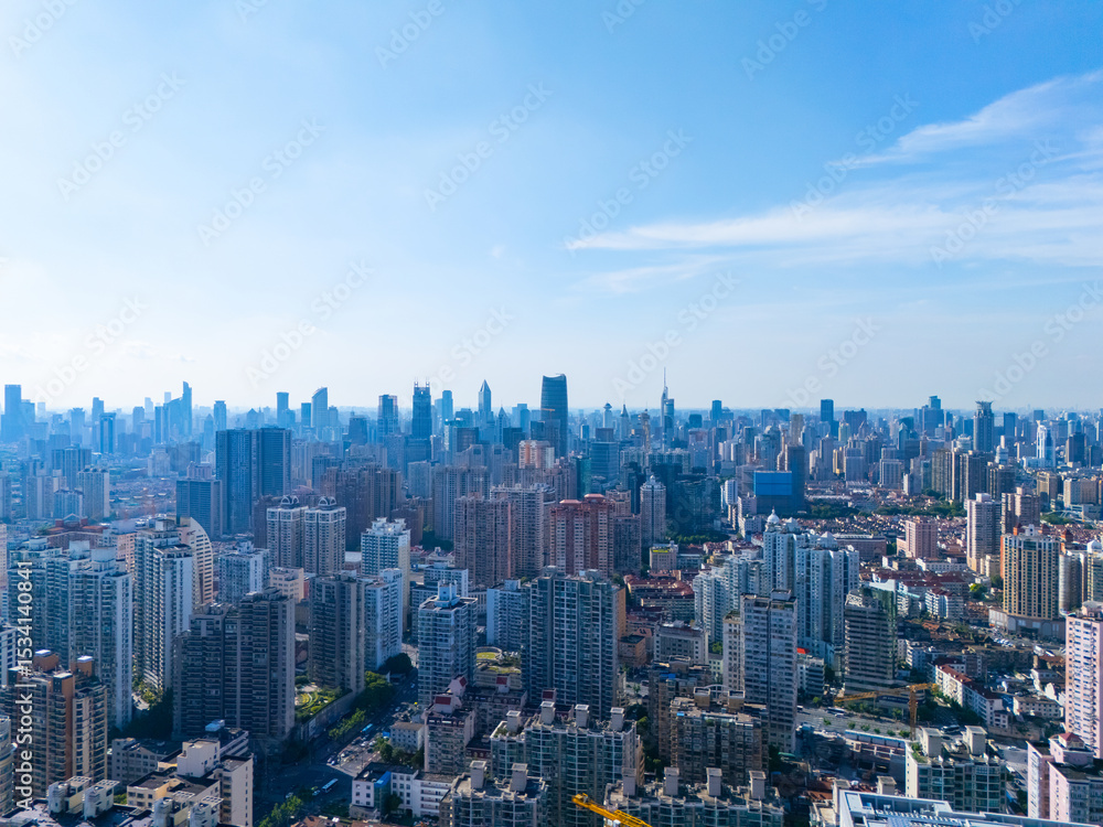 Obraz premium Aerial view of Shanghai skyscraper in downtown with blue sky background.