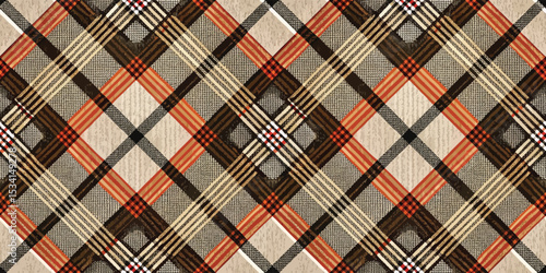 A vibrant plaid pattern featuring warm colors and intricate designs.