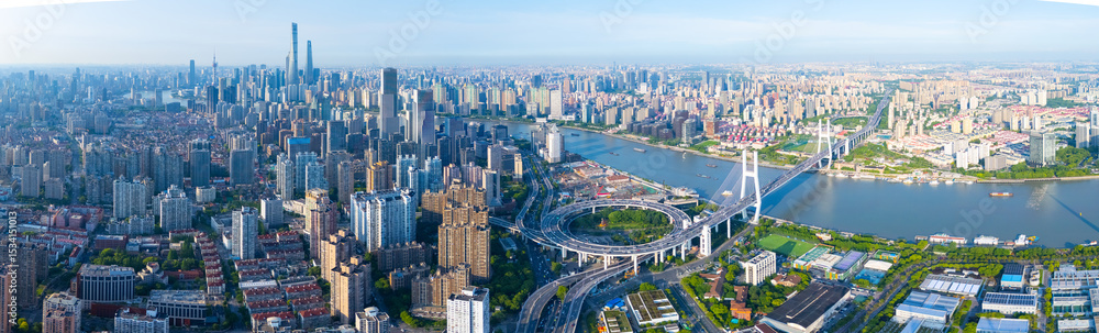 Fototapeta premium Aerial view of NanPu Bridge and Huangpu river on sunny day, Shanghai.