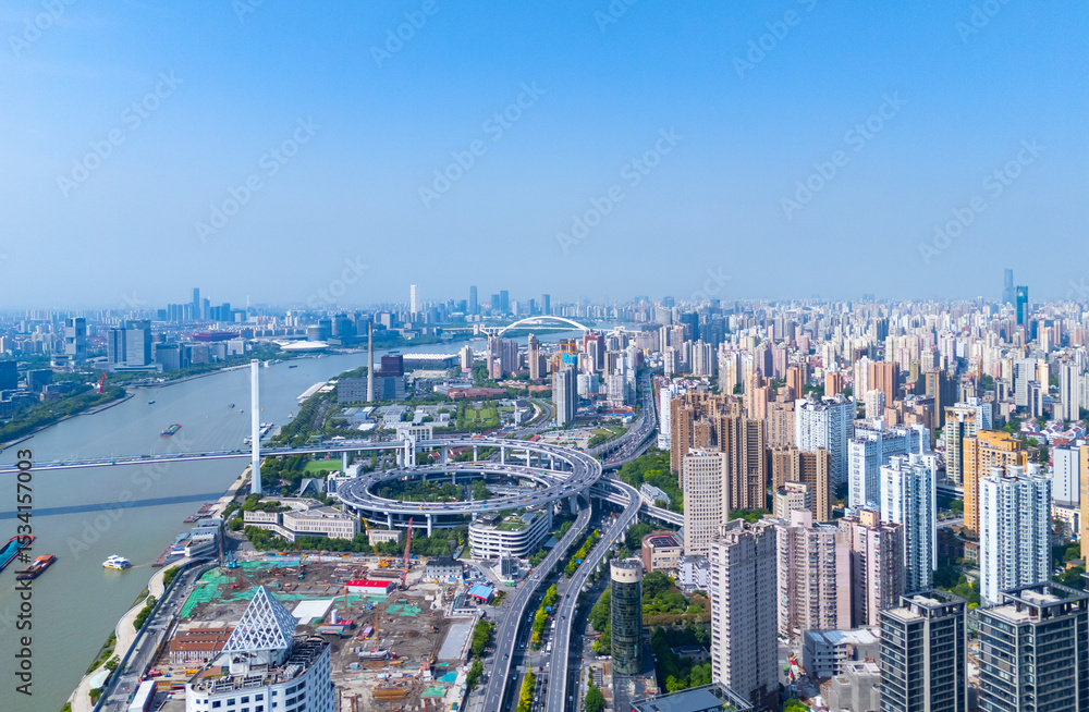 Fototapeta premium Aerial view of NanPu Bridge and Huangpu river on sunny day, Shanghai.