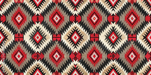 Vibrant geometric pattern with bold reds and earthy tones in a striking textile design.