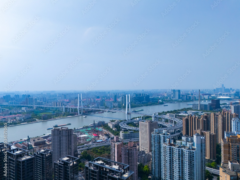 Fototapeta premium Aerial view of Shanghai skyscraper in downtown with blue sky background.