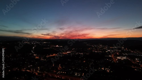 Sunset Aerial View of Fribourg Area with City Lights, Switzerland
