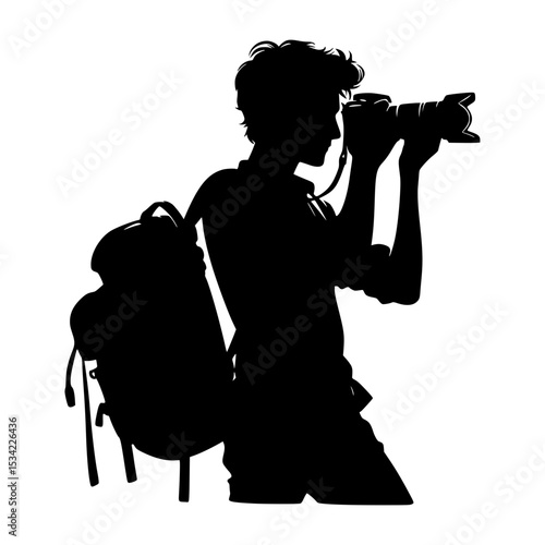 Silhouette of photographer with backpack taking a photo