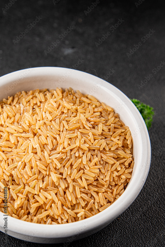 Brown rice whole grain cereal product superfood fresh tasty gourmet food background on the table rustic food top view copy space Brown rice whole grain cereal product superfood fresh tasty gourmet food background on the table rustic food top view copy space