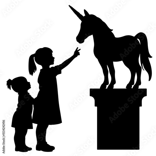 Silhouette of children pointing at unicorn statue, imaginative play and wonder
