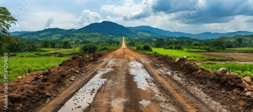 Dirt road winding through a rural landscape