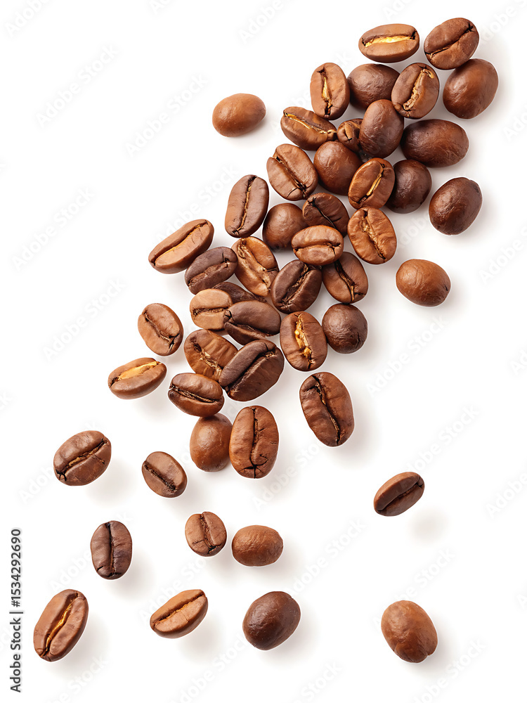 Naklejka premium Scattered roasted coffee beans on a white background showing varied shades of brown and bean textures