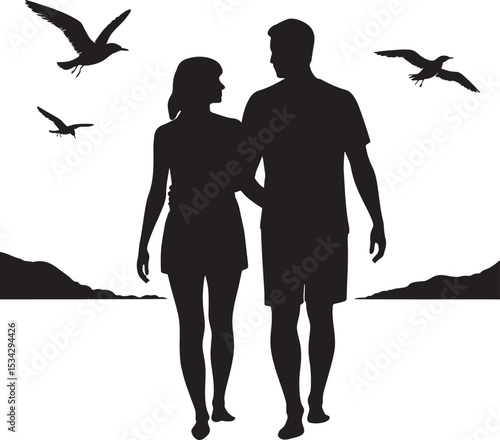Silhouetted romantic couple walking together on a beach with flying seagulls and coastal landscape