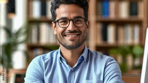 Smiling Man in Glasses

