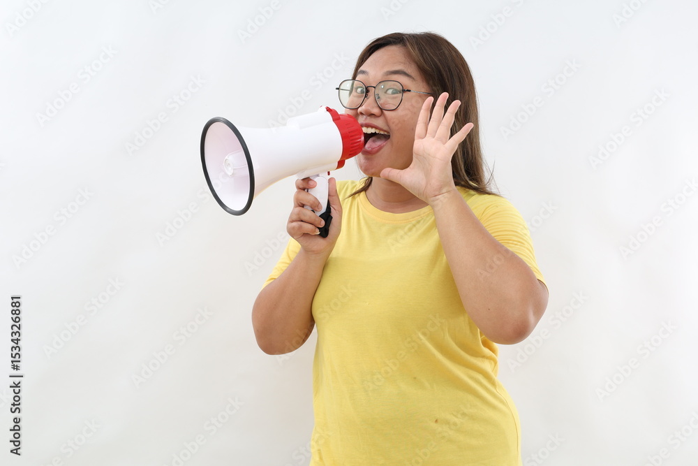Naklejka premium Asian woman screaming while holding megaphone with hands making announcement