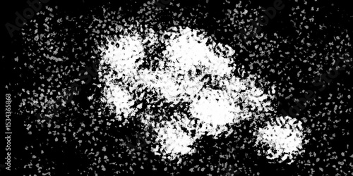Snowflakes on dark background. white icy snowflakes isolated on black background, natural background. white crystalline powder on a black background. sugar dust. texture, pattern and clipping.