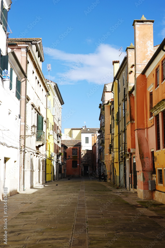 Obraz premium Old canals and streets in Chioggia, Italy
