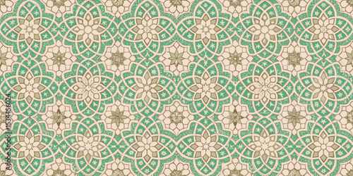 Intricate teal and beige floral pattern design.