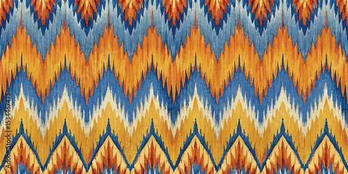 Vibrant blue and orange zigzag pattern with a textured appearance.