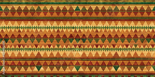 Colorful geometric patterns in earthy tones create a vibrant textile design.