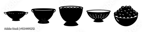 Black silhouette illustration of kitchen bowls and colanders with fruit spilling out