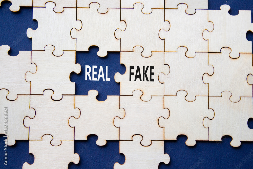 Real or Fake symbol. Concept word Real or Fake on wooden blocks. Beautiful deep blue background. Business and Real or Fake concept. Copy space Real or Fake symbol. Concept word Real or Fake on wooden blocks. Beautiful deep blue background. Business and Real or Fake concept. Copy space