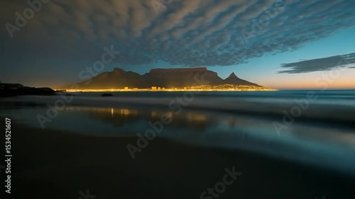 Mesmerizing Time-Lapse: Table Mountain View from Beach with Transition from Day to Night
