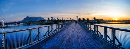 Tableau sur toile Panorama of Woodbridge Island bridge, Milnerton Lighthouse and Table Mountain at