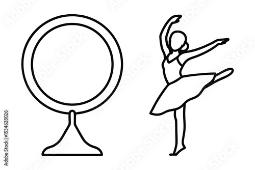 Ballerina practicing at the barre reflected in a mirror