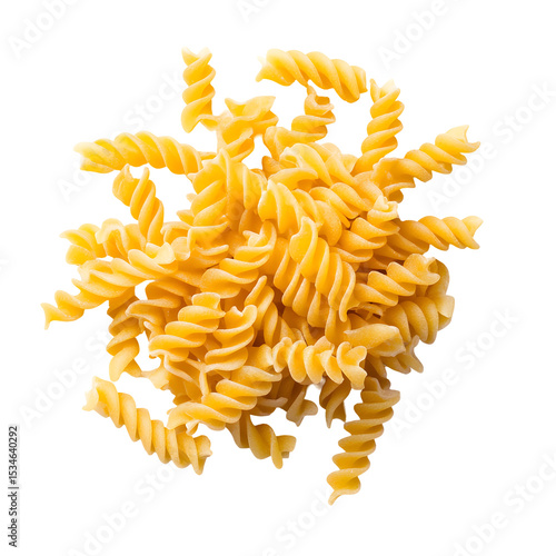 Pile of uncooked fusilli pasta against a stark black background studio shot