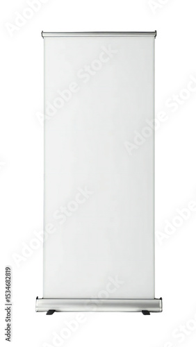 A close up of a blank white retractable banner stand against a black studio background space for text