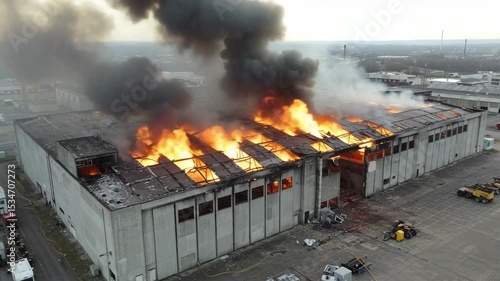 Dramatic Fire Erupts in Abandoned Warehouse with Thick Smoke Plumes