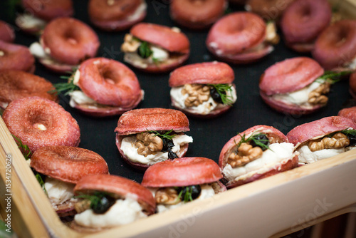 Tray of mini beetroot donuts and filling