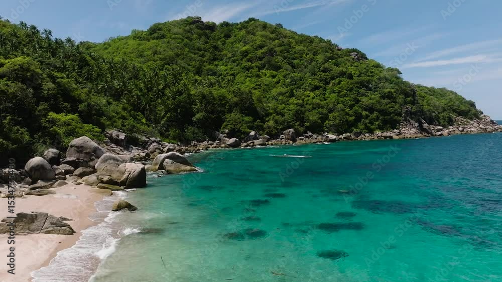 Tropical bay with green hills meeting blue ocean under clear skies. Koh Tao, Thailand. Tropical bay with green hills meeting blue ocean under clear skies. Koh Tao, Thailand.